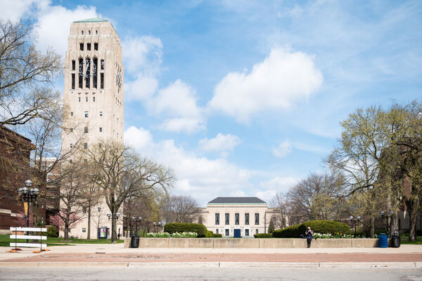 Burton Memorial Tower on a sunny day with the Rackham Building behind it