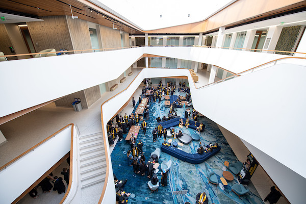 An atrium with curving and overlapping strairwells