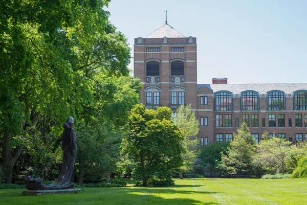 The exterior of Martha Cook and its grounds on a sunny day