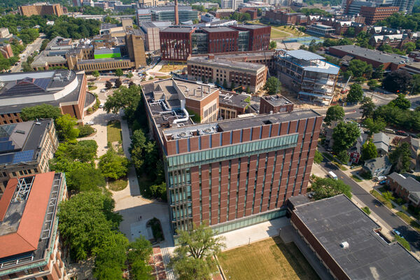 A bird's-eye view tall brick and glass exterior of Weiser Hall